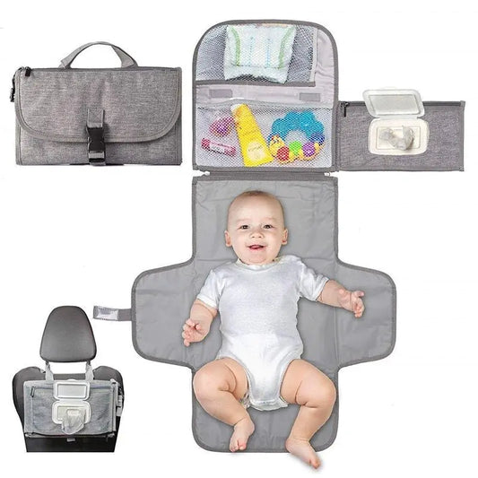 SnuggleShift™ Portable Baby Changing Pad Bag busy kiddie